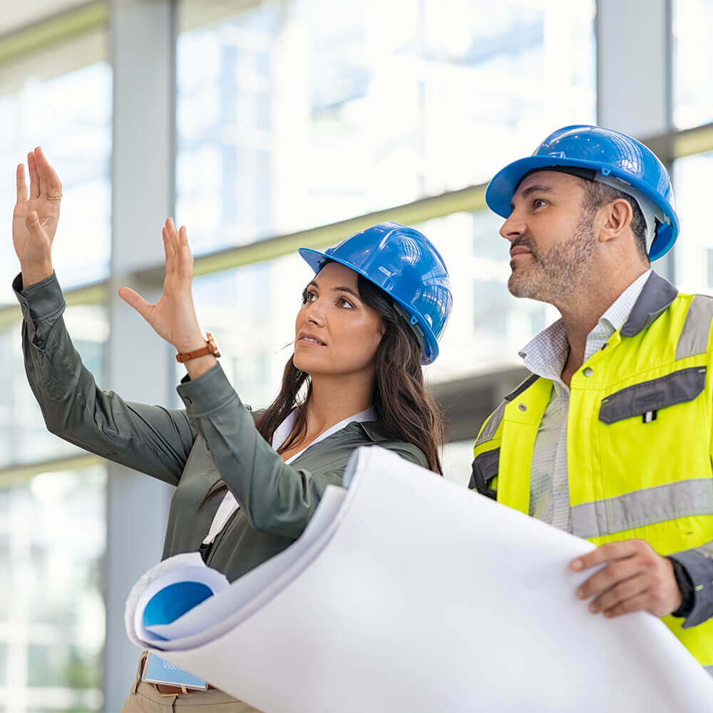 Architects looking at project on site